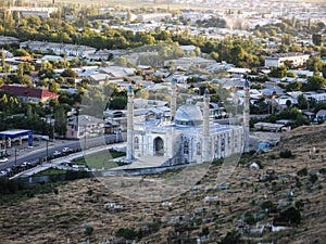 Sulaiman-Too Mountain. View of the city of Osh. Mosque photo