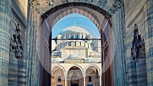 Suleymaniye Mosque architecture details with dome and entrance door, Istanbul, Turkey