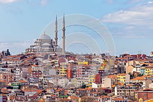 Suleymaniye mosque with colorful residential house area in Istanbul with blue sky background, Turkey, Istanbul Mosque Suleymaniye
