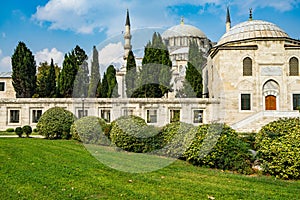Suleymaniye Mosque surrounded by the garden under the sunlight and a blue sky in Istanbul in Turkey