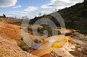 Sulfur and iron polluted river at Sao Domingos abandoned mine