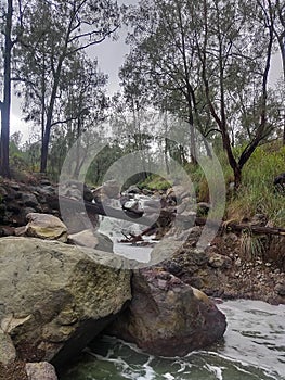 a sulfur river named kali pait is located in Ijen Indonesia