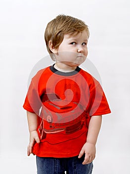 Sulky preschool boy photo