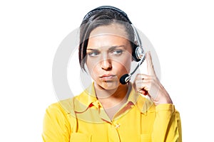 Sullen call centre operator listening to a call