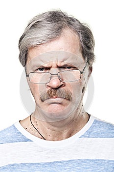 Sullen caucasian mature man in glasses isolated photo