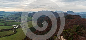 Sulov village with Sulovske skaly mountains in Slovakia during autumn cloudy day