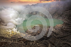 Sulphatic lake in a crater of volcano Ijen