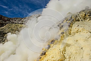Sulphur mining, Kawah Ijen, Java, Indonesia photo