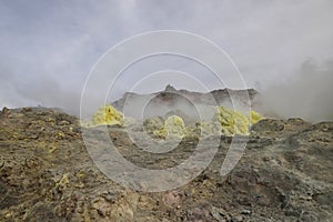 Sulphur pieces on Iozan (sulfur mountain) active volcano area, Akan National Park, Hokkaido, Japan