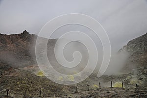 Sulphur pieces on Iozan (sulfur mountain) active volcano area, Akan National Park, Hokkaido, Japan