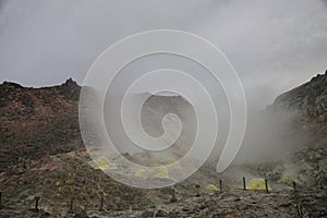 Sulphur pieces on Iozan (sulfur mountain) active volcano area, Akan National Park, Hokkaido, Japan