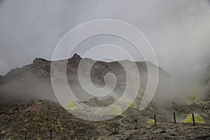 Sulphur pieces on Iozan (sulfur mountain) active volcano area, Akan National Park, Hokkaido, Japan