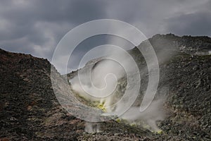 Sulphur pieces on Iozan (sulfur mountain) active volcano area, Akan National Park, Hokkaido, Japan