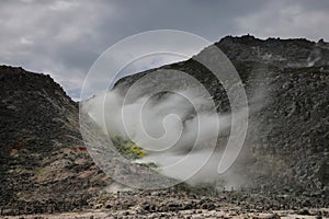 Sulphur pieces on Iozan (sulfur mountain) active volcano area, Akan National Park, Hokkaido, Japan