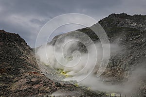 Sulphur pieces on Iozan (sulfur mountain) active volcano area, Akan National Park, Hokkaido, Japan