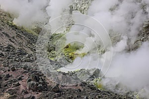 Sulphur pieces on Iozan (sulfur mountain) active volcano area, Akan National Park, Hokkaido, Japan