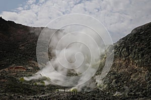 Sulphur pieces on Iozan (sulfur mountain) active volcano area, Akan National Park, Hokkaido, Japan