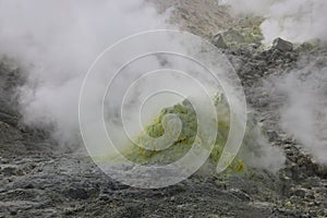 Sulphur pieces on Iozan (sulfur mountain) active volcano area, Akan National Park, Hokkaido, Japan