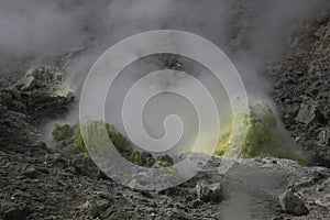 Sulphur pieces on Iozan (sulfur mountain) active volcano area, Akan National Park, Hokkaido, Japan