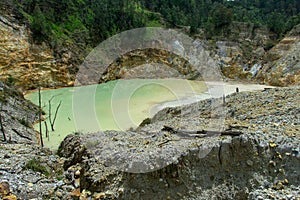 Sulphureous rocks and lake on the Vulcan Crater