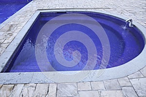 sulphurous, Swimming pool steps with clear water surface background, nobody. empty pool texture, underwater pattern blue