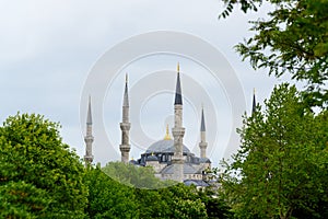 Sultan Ahmet Mosque, also known as Blue Mosque of Istanbul, during a storm with cloudy sky. Spectacular and dramatic view of