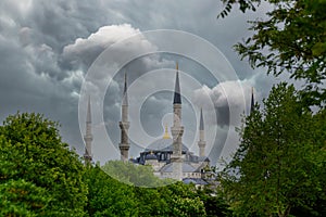 Sultan Ahmet Mosque, also known as Blue Mosque of Istanbul, during a storm with cloudy sky. Spectacular and dramatic view of