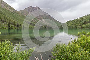 Sultry skies and reflections, St. Elias Lake, Kluane National Park