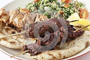 Sumac kebab kofta and taouk plate photo