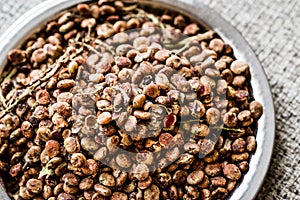 Sumac Seeds on silver plate