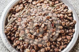 Sumac Seeds on silver plate