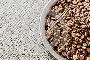 Sumac Seeds on silver plate