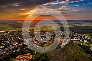 Sumeg, Hungary - Aerial panoramic view of the famous High Castle of Sumeg in Veszprem county at sunset with colorful clouds