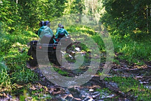 Summer Activities for adults - a trip on quad bikes on the dirty road.