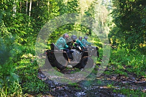 Summer Activities for adults - a trip on quad bikes on the dirty road.