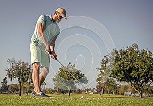 summer activity. professional sport outdoor. male golf player on professional golf course.