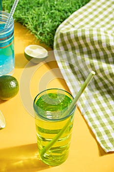 Summer alcoholic cocktails in colorful glasses on beach with white sand. Summer sea ocean vacation and travel concept