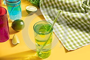 Summer alcoholic cocktails in colorful glasses on beach with white sand. Summer sea ocean vacation and travel concept