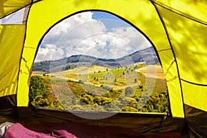 Summer Altai landscape with hills and meadows . View from camping tent entrance