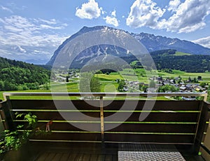 Summer austrian landscape with Grimming mountain 2.351 m an isolated peak in the Dachstein Mountains, view from small alpine