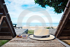 Summer background beautiful beach have hat place on wood table n