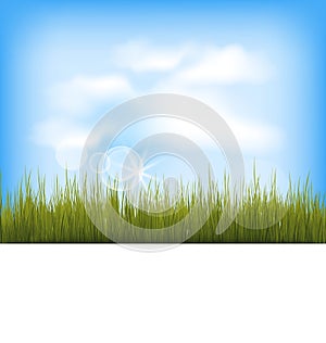 Summer background with green grass, blue sky, clou