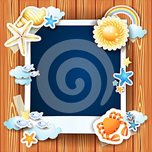 Summer background with photo frame and shells