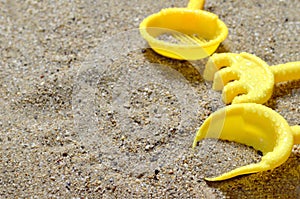 Summer background with sand toys on the beach