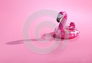 Summer backgrounds. 3d flamingo shape inflatable swimming pool ring for floating.