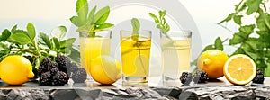 Summer banner with freshly squeezed juices in transparent glasses