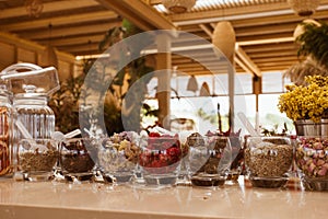 Summer bar on the beach with ingredients for cocktails .This bar is made with cane bamboo,wooden and straw rope.Summer