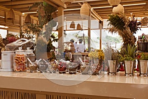 Summer bar on the beach with ingredients for cocktails .This bar is made with cane bamboo,wooden and straw rope.Summer