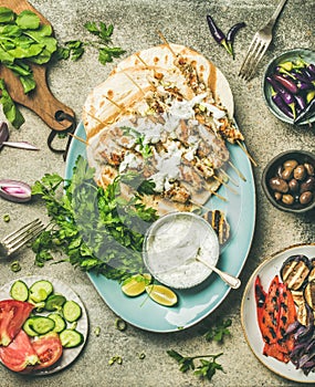 Summer barbecue party dinner set with grilled chiken and vegetables