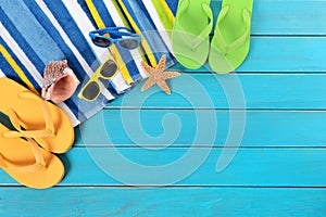 Summer beach background border flip flops sunglasses copy space